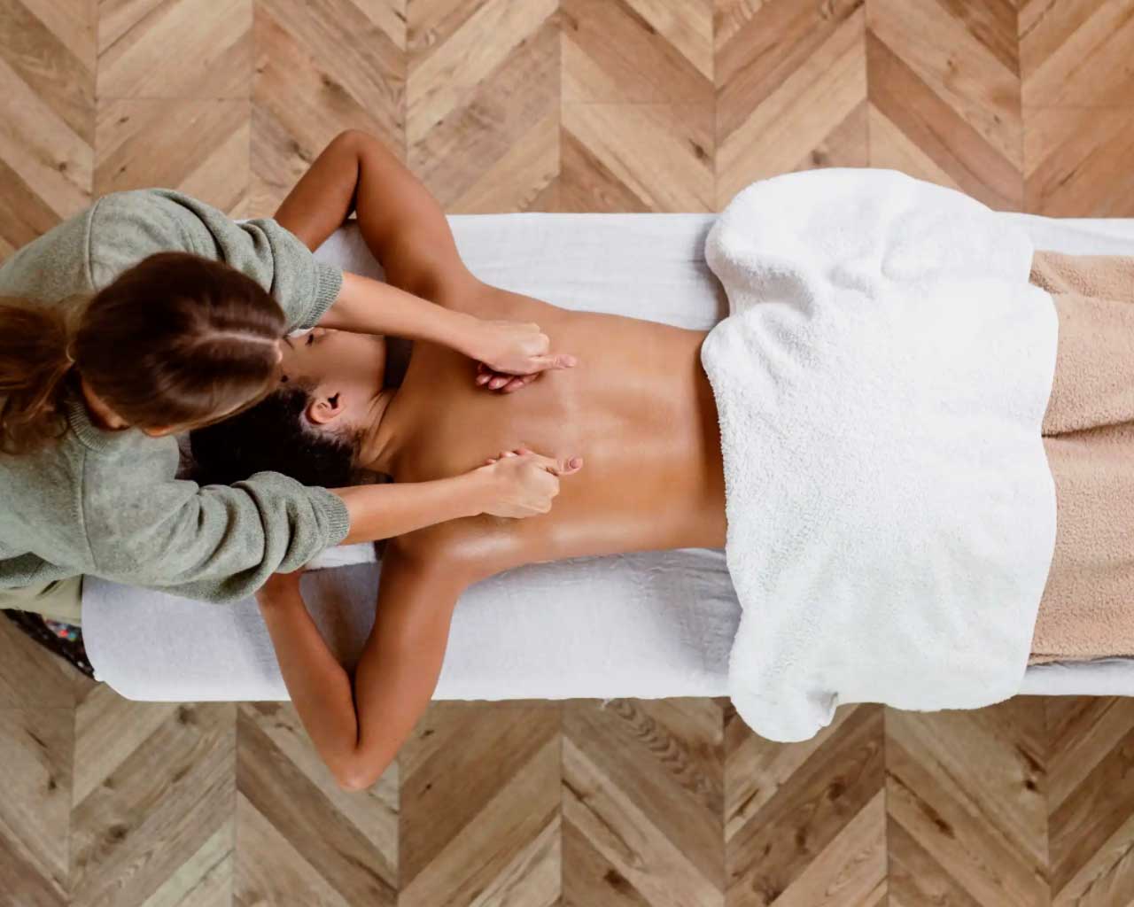 Woman gets a deep healing massage